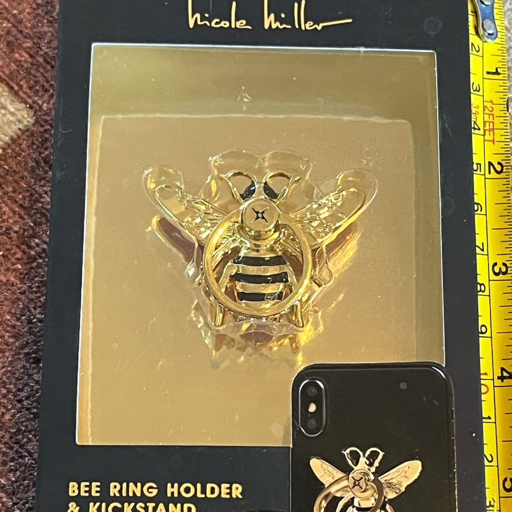 Nicole Miller bee ring stand for cell phone